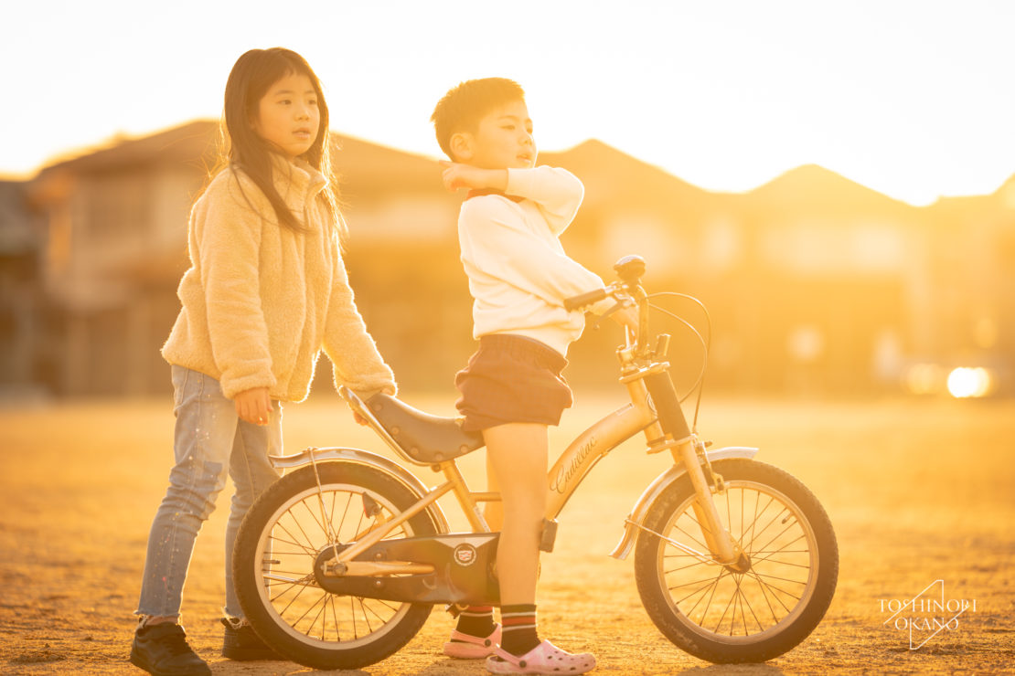 photo 43 Siblings riding a bicycle